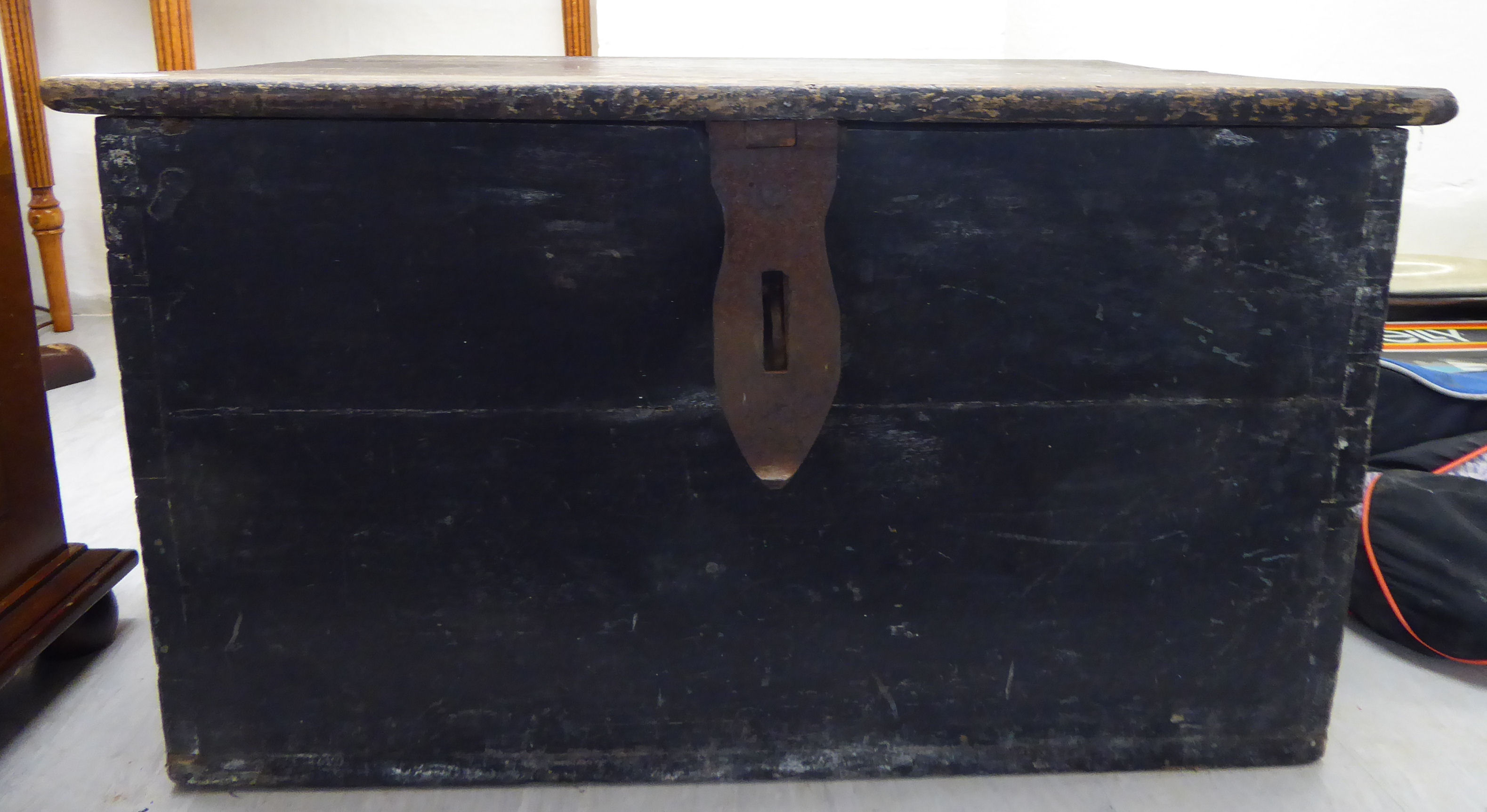 A mid/late 19thC stained hardwood chest with a hinged lid,