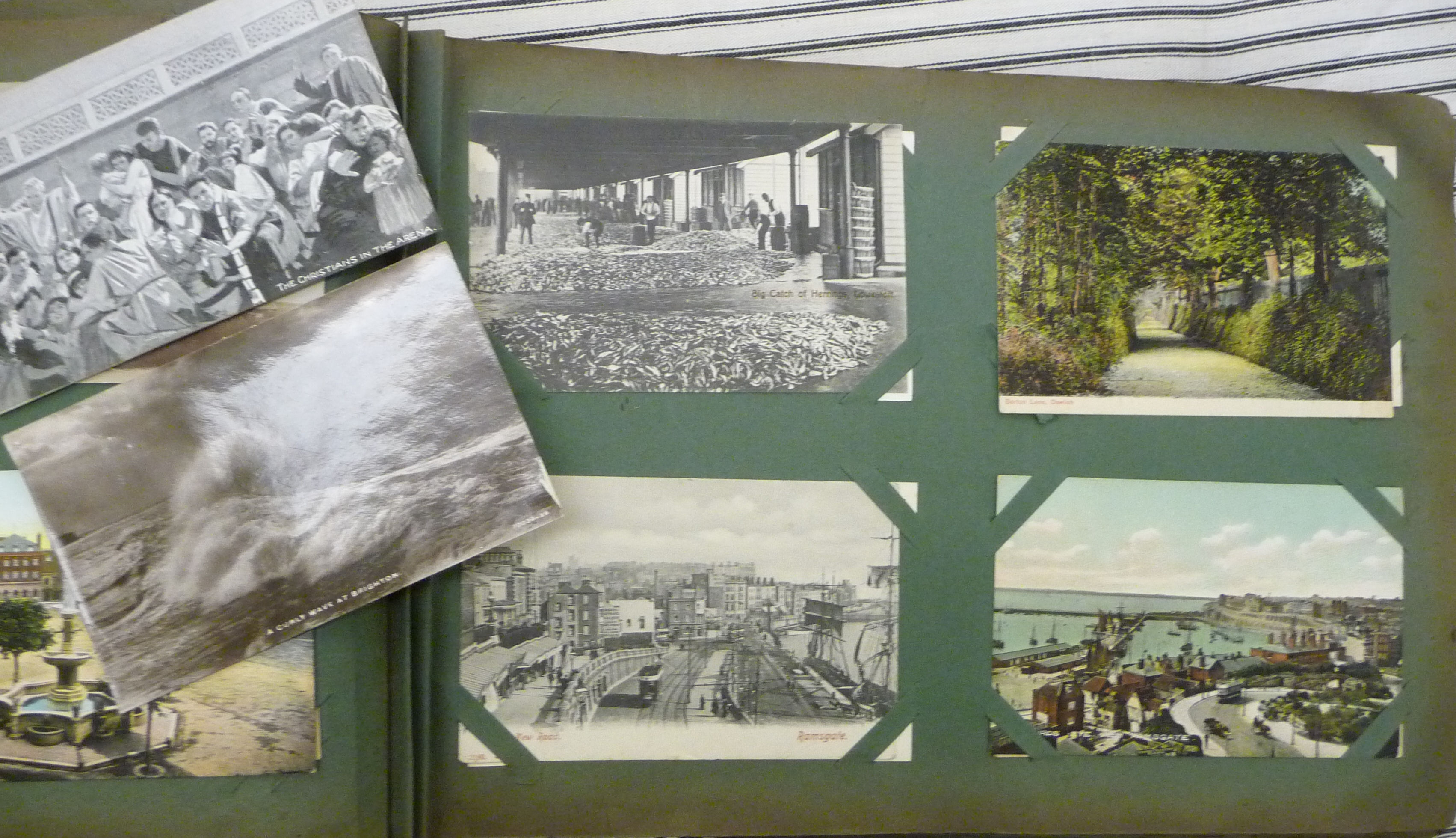 An uncollated early 20thC postcard album, containing seaside, - Image 3 of 5
