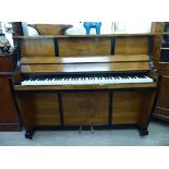 An Art Deco Waldberg, walnut veneered and ebonised, upright, iron framed piano 45.