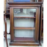 A late 19thC mahogany pier cabinet, the full-height,