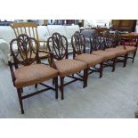 A set of six Regency inspired mahogany framed dining chairs, each with a triple arched,