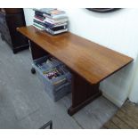 A mid 20thC mahogany table,