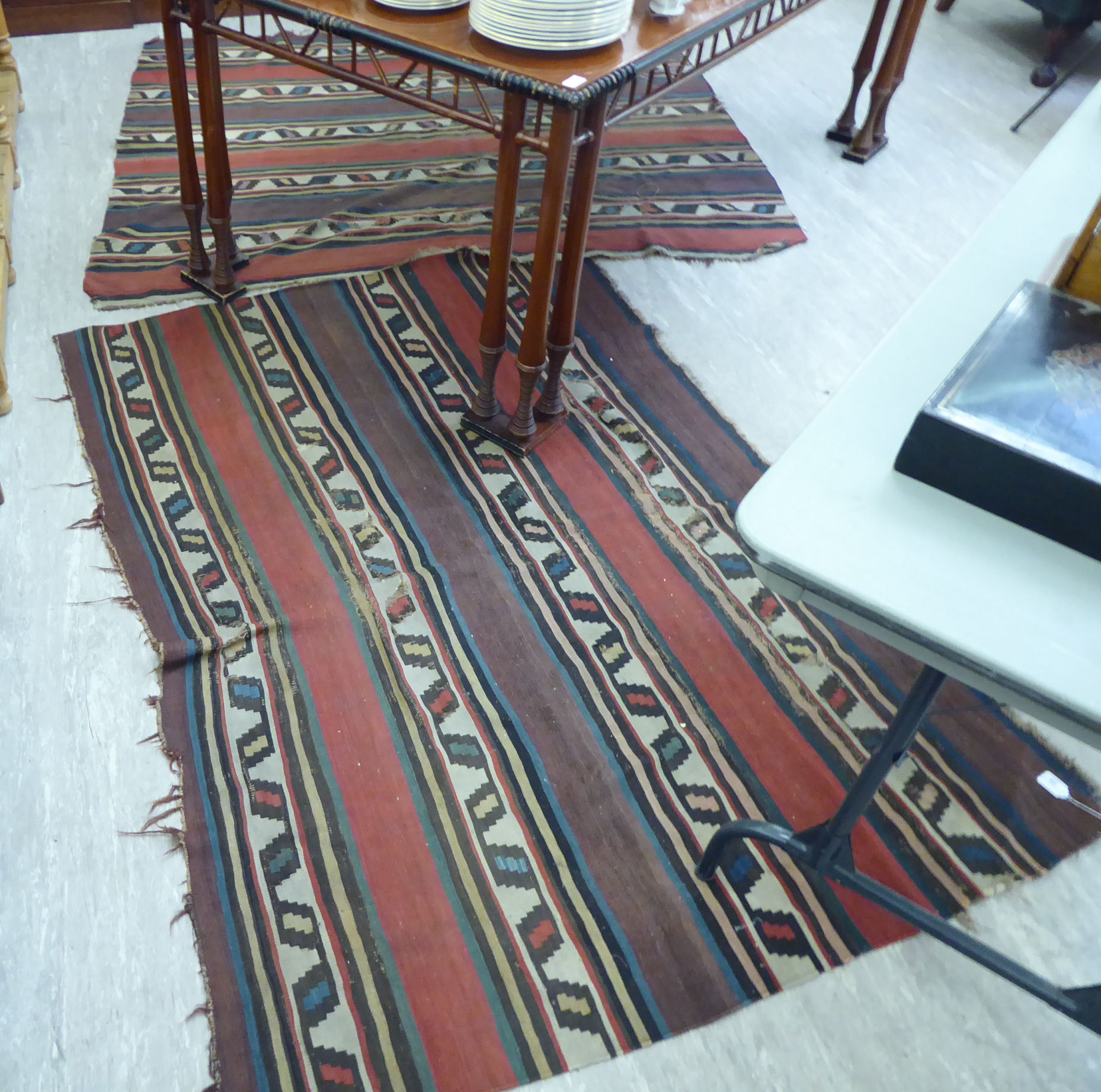 Two similar Afghan rugs with panelled,