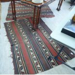 Two similar Afghan rugs with panelled,