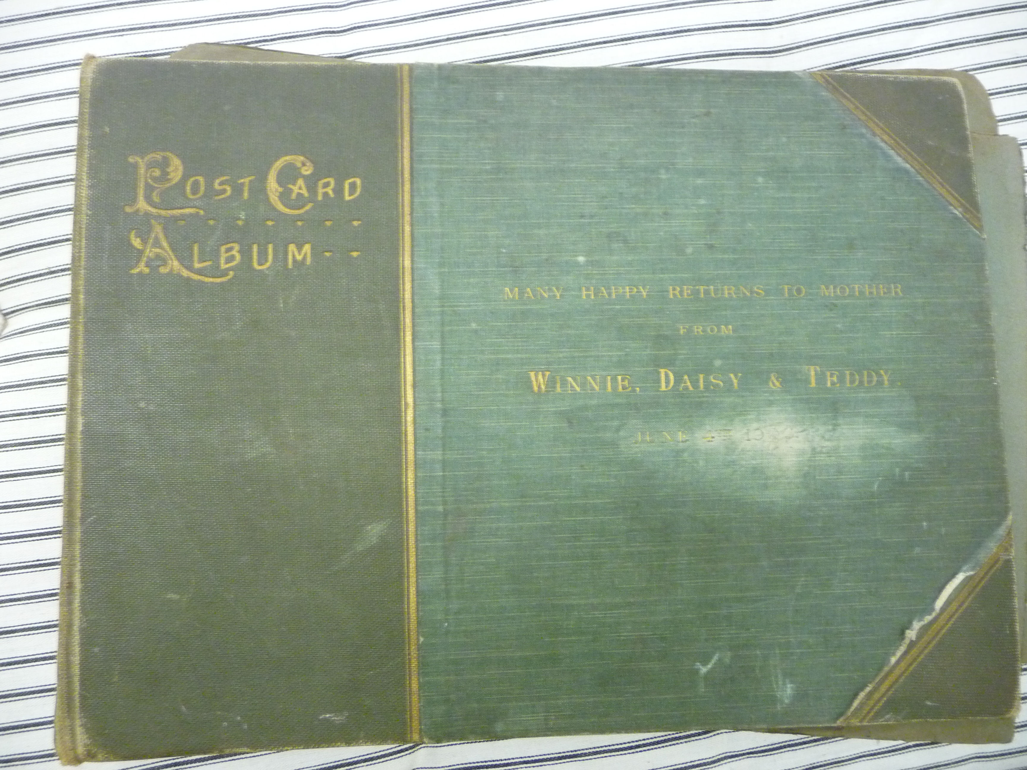 An uncollated early 20thC postcard album, containing seaside,