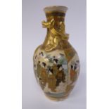 An early 20thC Satsuma gilded earthenware ovoid shaped vase, overlaid with a dragon,