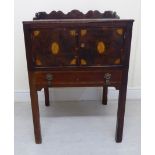 An early 19thC mahogany night table with a galleried upstand, over a pair of doors,