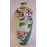 A 20thC enamelled vase of slender baluster form, decorated in colours with mixed flora,