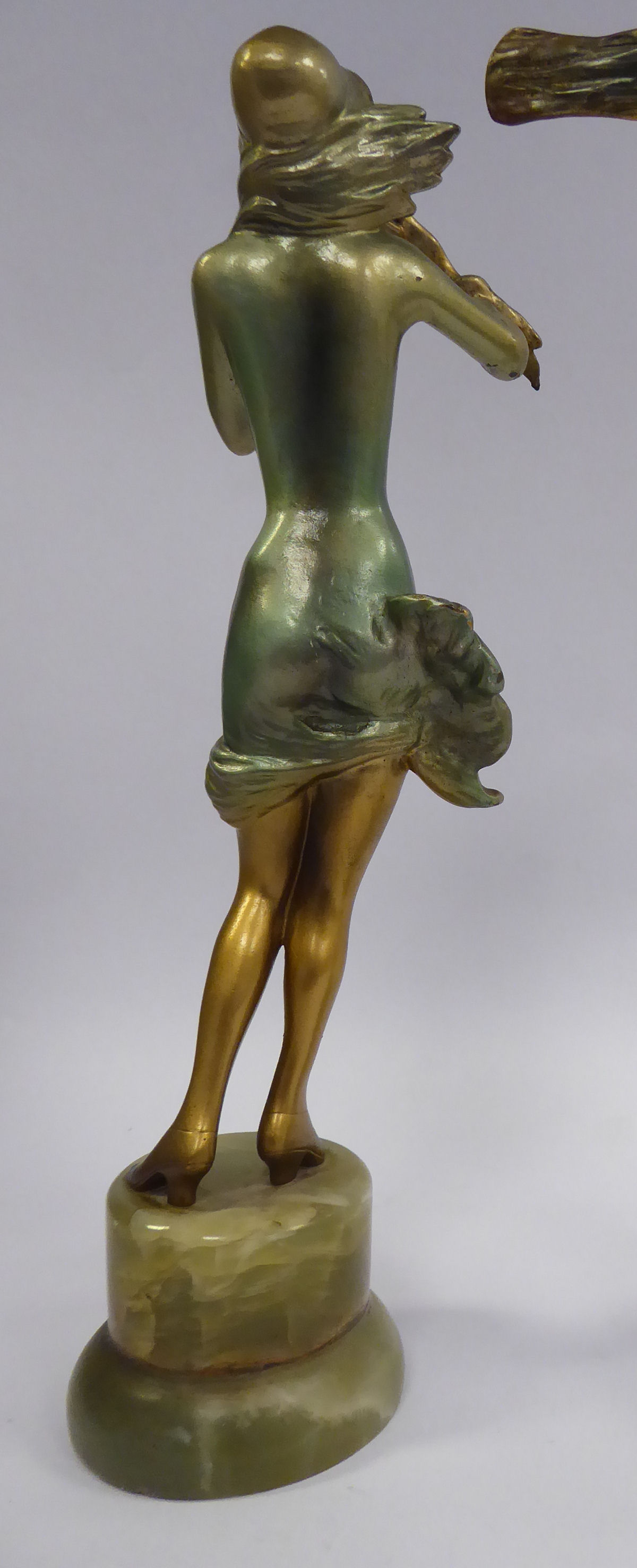 A late 1920s/early 1930s painted cold cast figure, a fashionable young woman, wearing a bonnet, - Image 3 of 4