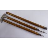 An Edwardian lady's turned walnut and nickle plated novelty walking cane,