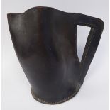 An 'antique' Black Jack moulded and stitched hide jug with an angular handle 10''h