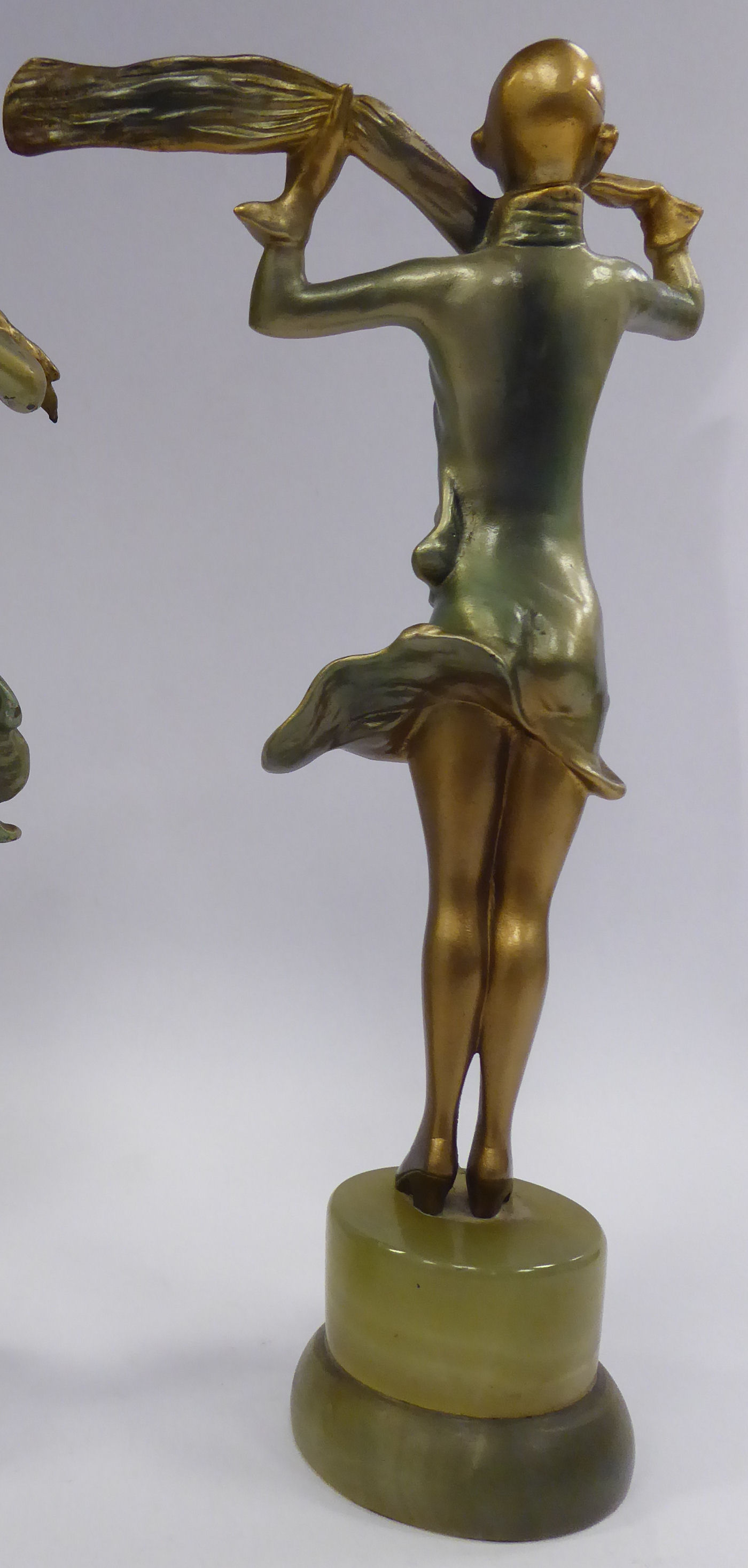 A late 1920s/early 1930s painted cold cast figure, a fashionable young woman, - Image 3 of 4