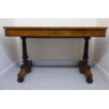 A late 19thC burr veneered maple and mahogany library table,