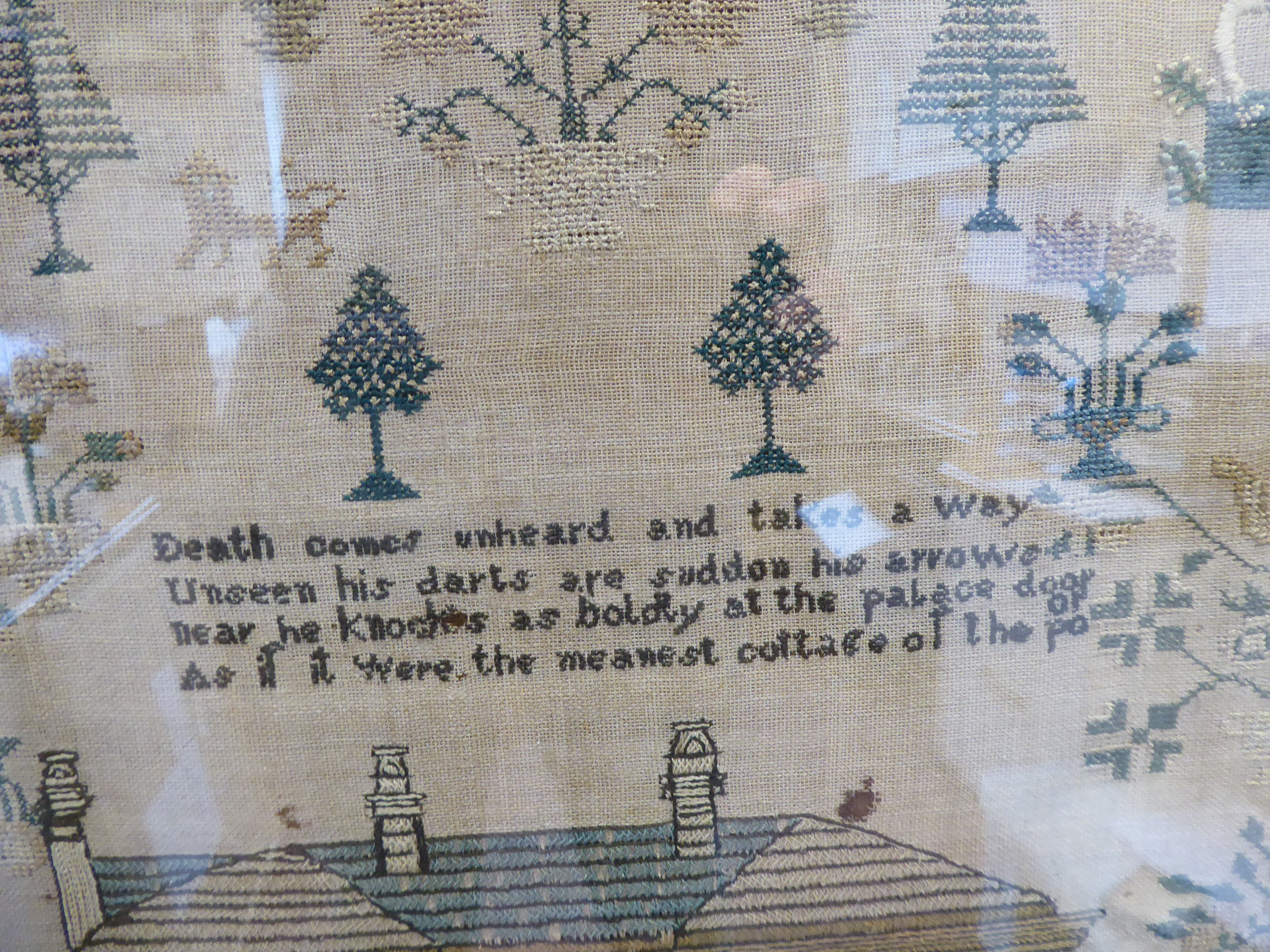 A George IV sampler, featuring a two storey house, stylised trees, birds and border ornament, - Image 2 of 4