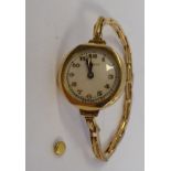 A lady's 9ct gold cased bracelet wristwatch, faced by an Arabic dial,
