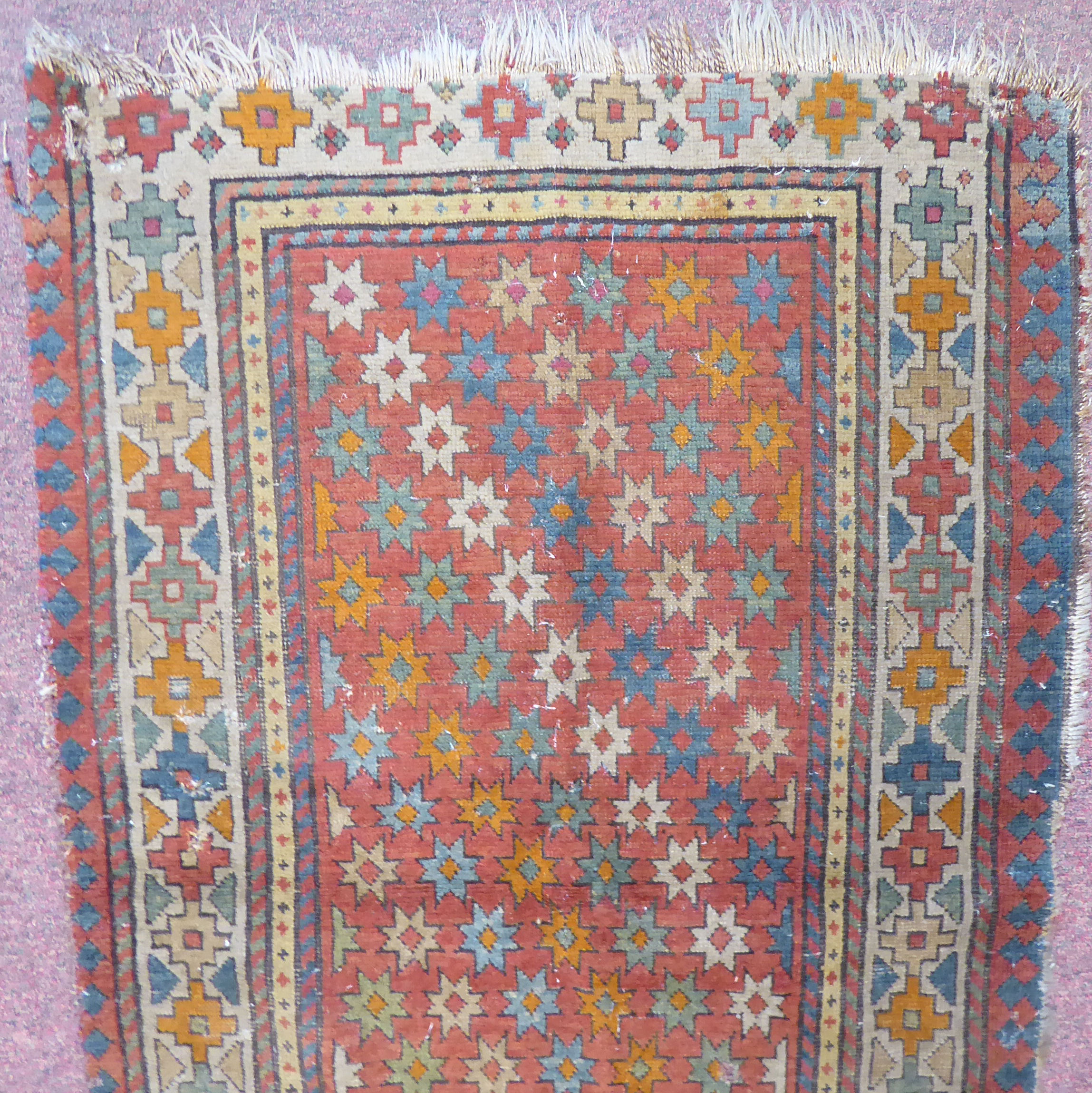 A 19thC Turkish prayer rug, decorated with stars, - Image 3 of 7