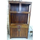 An early 1970s bespoke rosewood cabinet, the superstructure comprising three open display shelves,