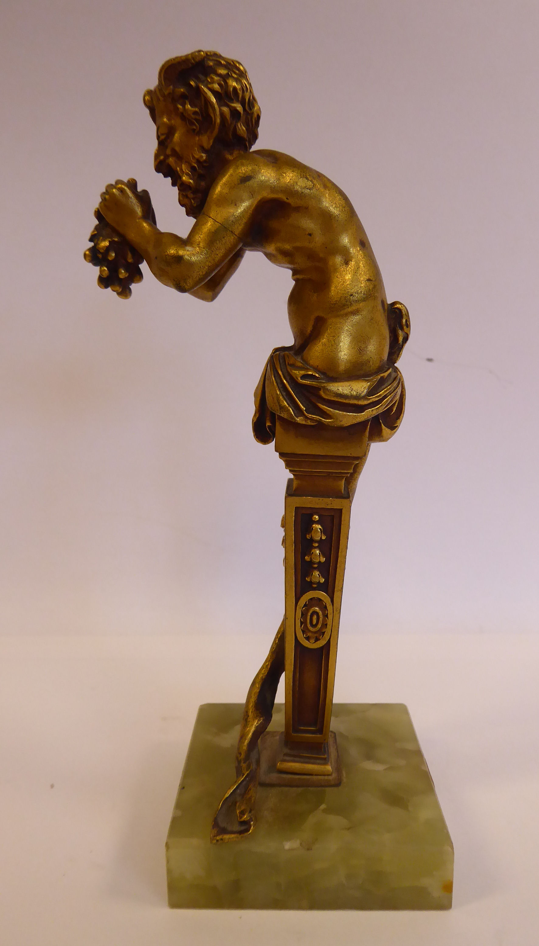 A cast gilt bronze statue, Bacchus, on a tapered column and a square, - Image 2 of 6