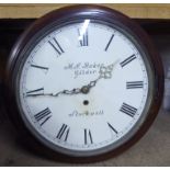 A late 19thC mahogany cased wall timepiece, in a turned surround,