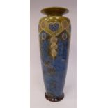 An early 20thC Royal Doulton sponged blue, green and white glazed stoneware vase of slender,