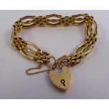 A 9ct gold three bar, gatelink bracelet,