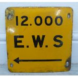 An enamelled steel, black on yellow notice '12.000 E.W.