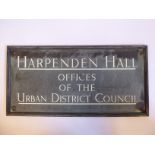 A brass nameplate with enamelled white letters, Harpenden Hall,