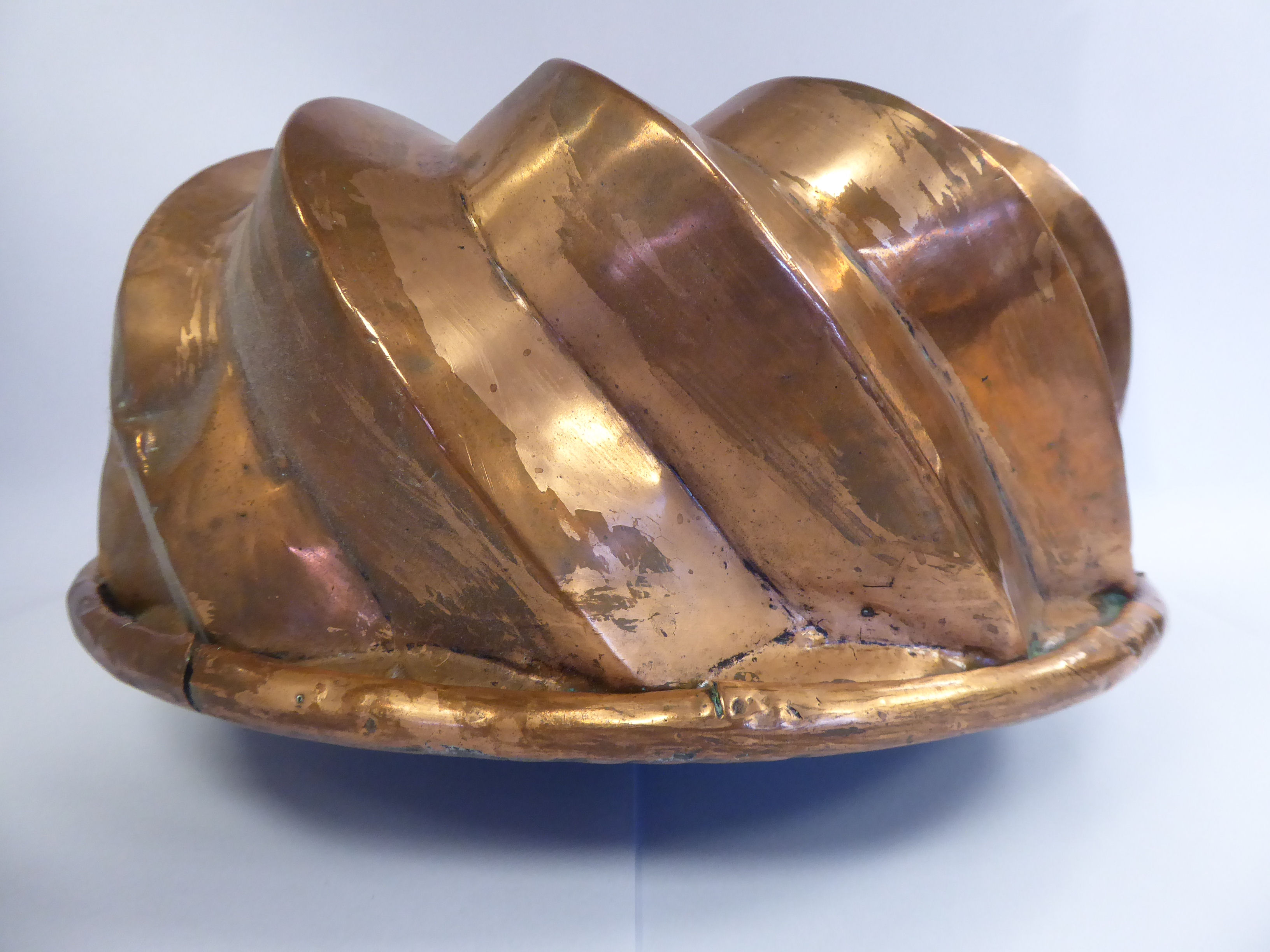 A mid 19thC copper jelly mould of wrythen doughnut form 10''dia - Image 3 of 3