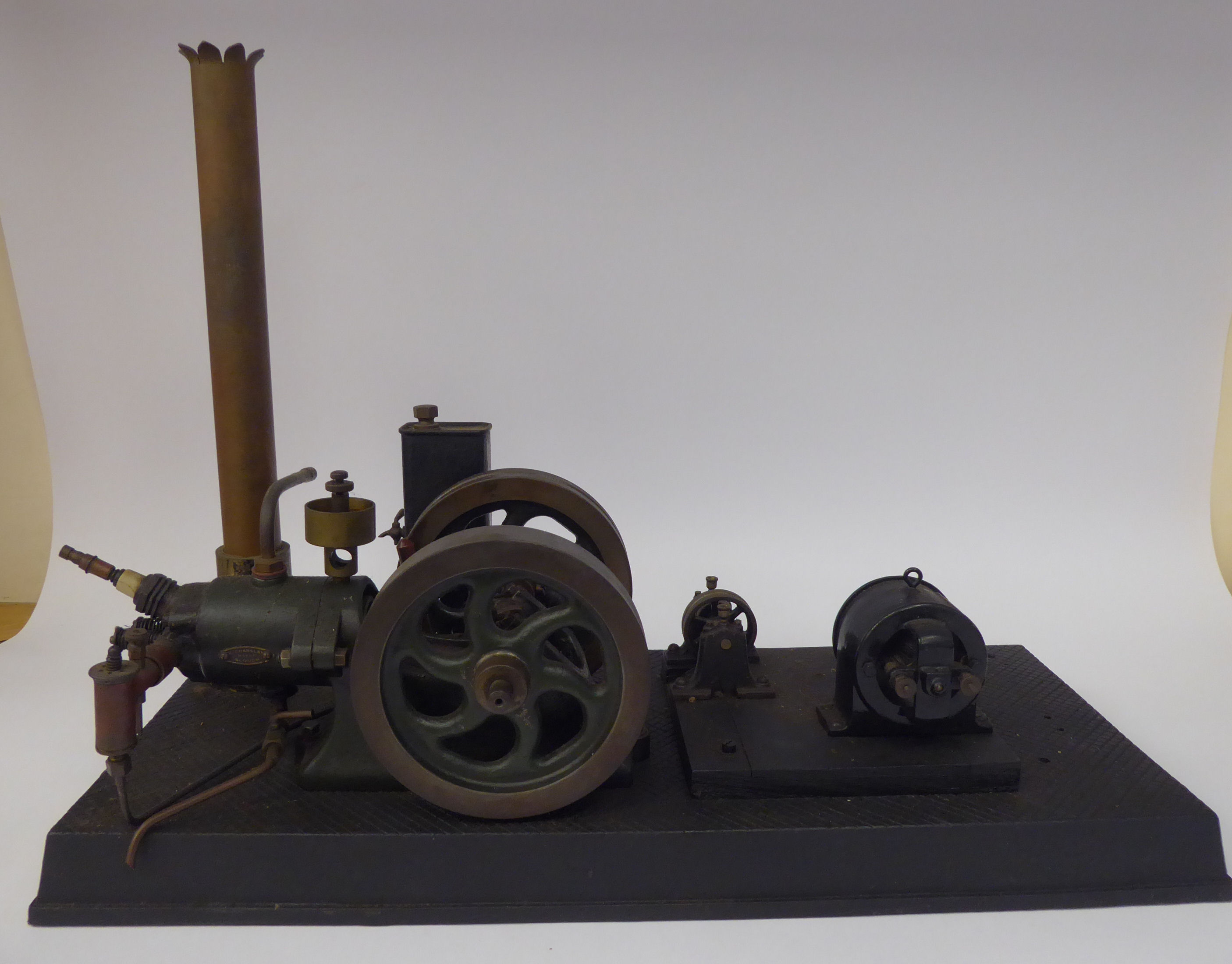 An early 20thC K Charsley of Slough black and green painted iron and steel model stationary,