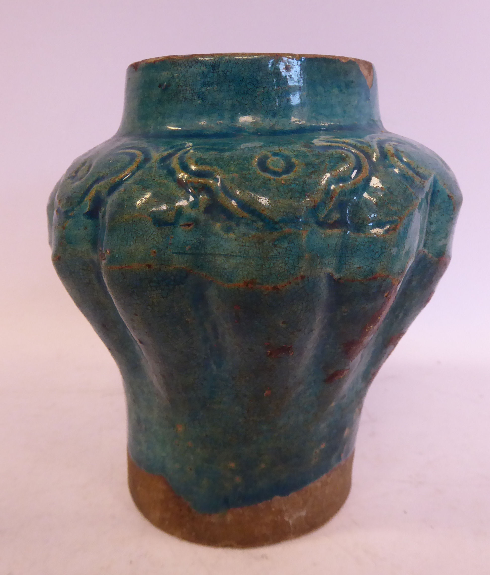 A late 17th/early 18thC Chinese turquoise glazed moulded,