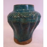 A late 17th/early 18thC Chinese turquoise glazed moulded,