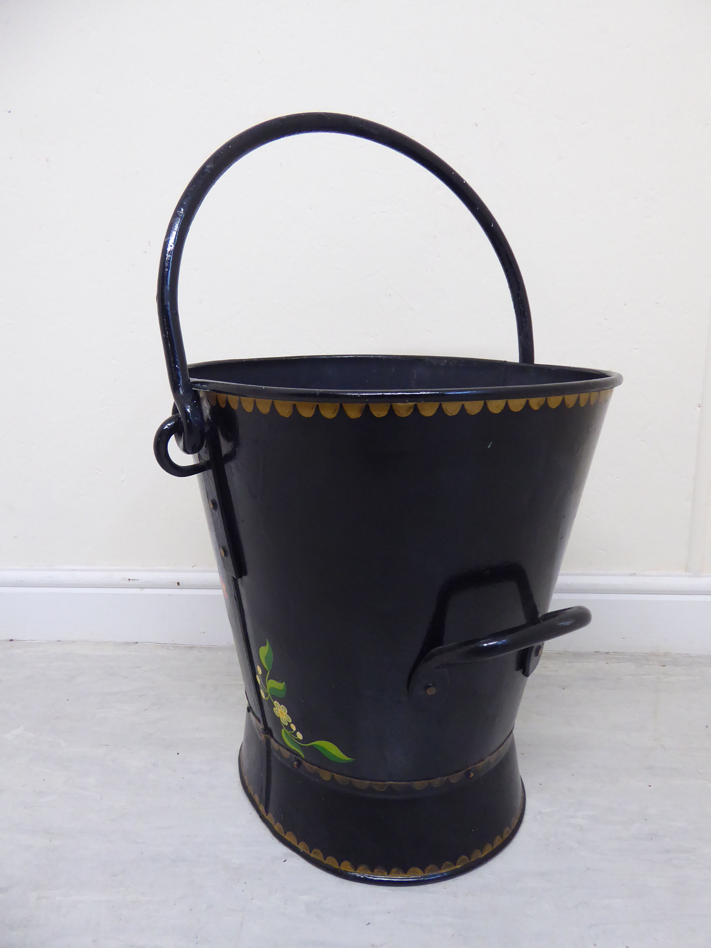 A late 19th/early 20thC Toleware bucket of tapered and waisted oval form with a rivetted fixed and - Image 3 of 6