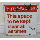 An enamelled steel, red on white notice 'Fire Escape ......