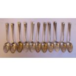 A set of eleven Edwardian silver Hanoverian rattail pattern teaspoons indistinct London makers