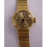 A lady's Piaget 18ct gold round cased bracelet wristwatch,