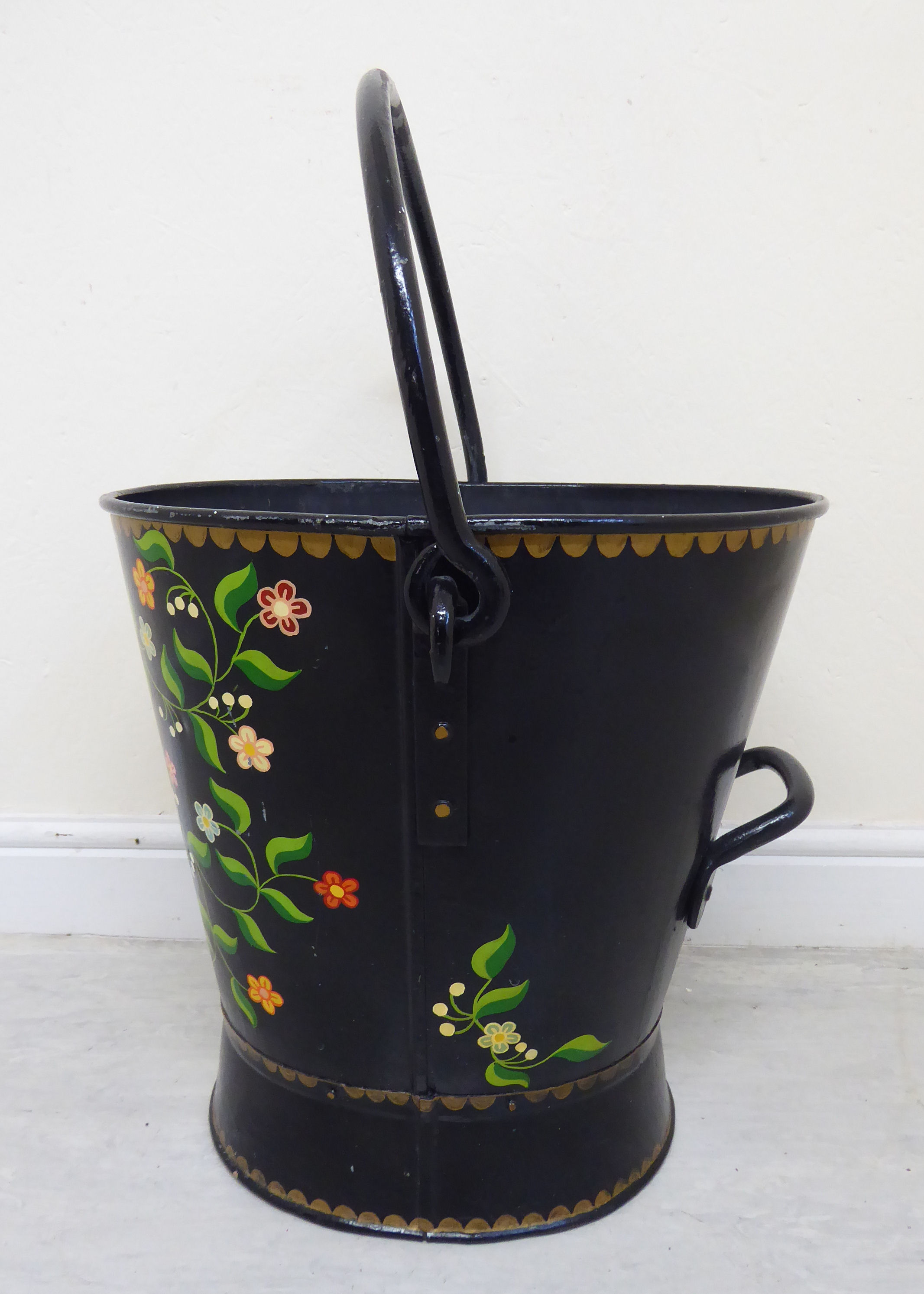 A late 19th/early 20thC Toleware bucket of tapered and waisted oval form with a rivetted fixed and - Image 2 of 6