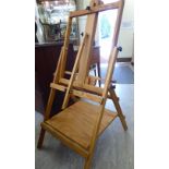 A Best artist's light oak easel 53''h;