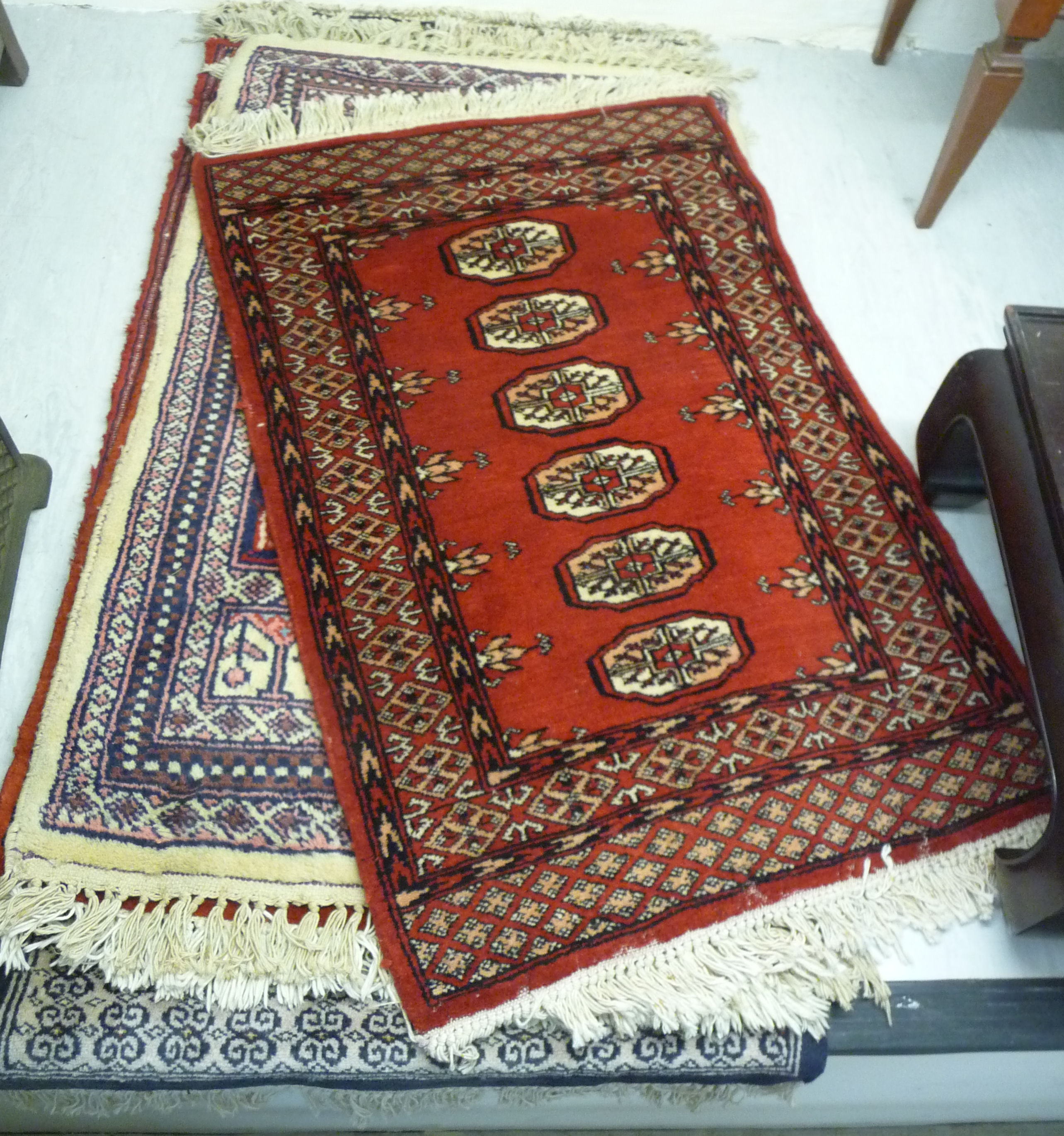 Five similar Turkoman and other rugs,