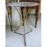A 1920s wrought iron framed terrace table with a steel top 27''h 20''dia;