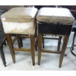 A pair of modern bar room stools, the square seats stud upholstered in hide and fur,