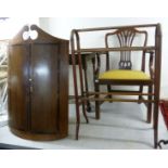 Small furniture: to include a George III oak hanging quadrant cabinet with a pair of doors,