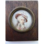 An early 20thC head and shoulders portrait miniature, a fashionable young woman 1.