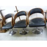 A set of three 'vintage' design salon chairs,