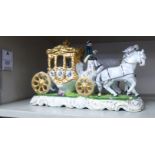 A 20thC Dresden china model, a ceremonial coach, drawn by a pair of white horses 7.