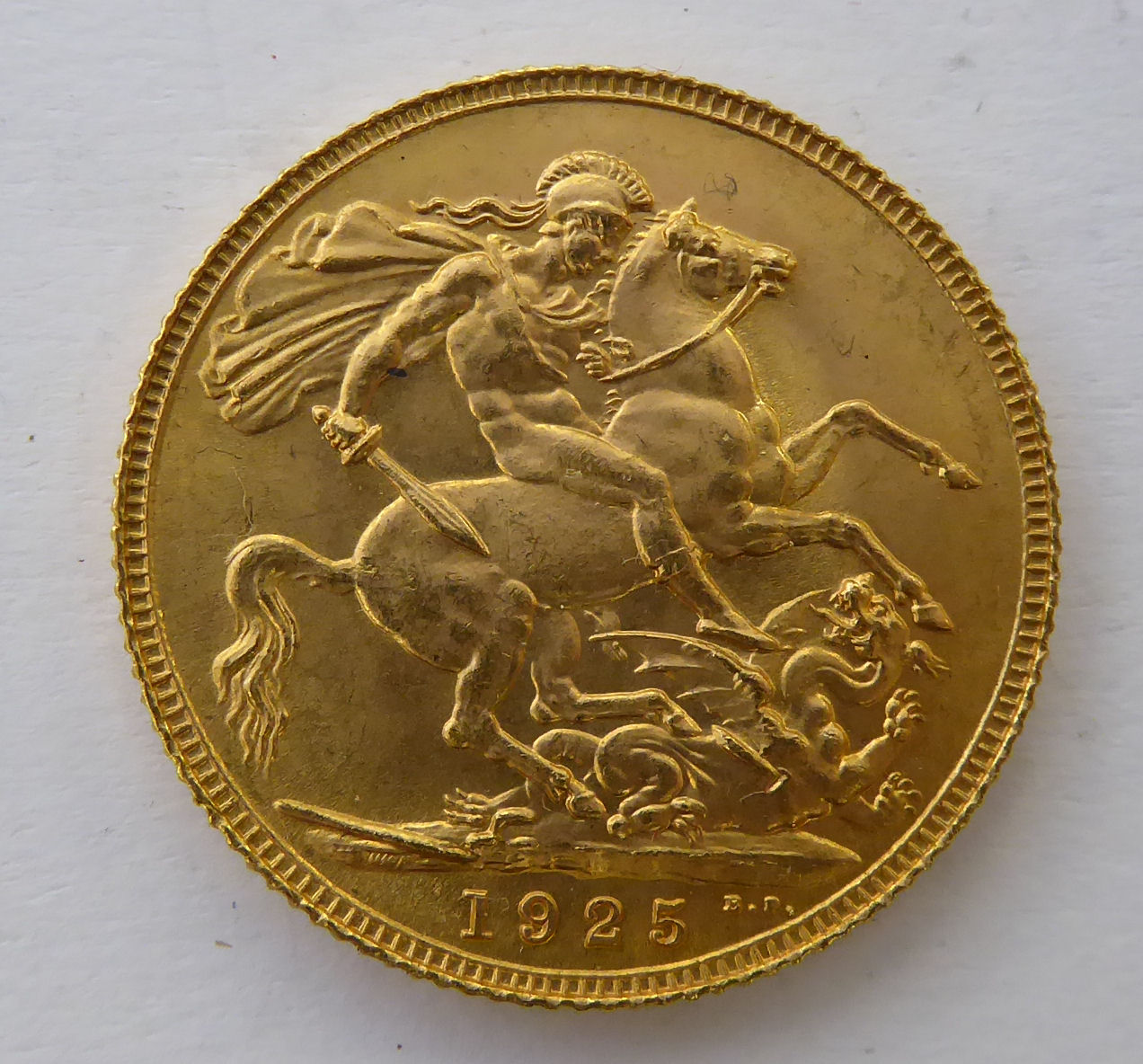 A King George V sovereign,