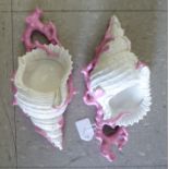 A pair of late Victorian naturalistically moulded ivory coloured and pink glazed porcelain,
