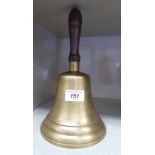 A reproduction of an early 20thC brass school bell OS4
