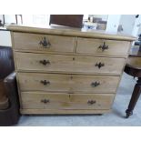 A late Victorian bleached pine five drawer dressing chest,