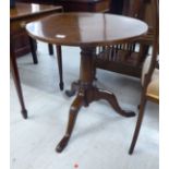 A George III oak pedestal table,