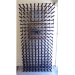 A modern pine and aluminium framed wine rack with provision for 180 bottles 77''h 37''w BSR
